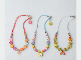 Cuentas plasticas flor amarilla carita feliz